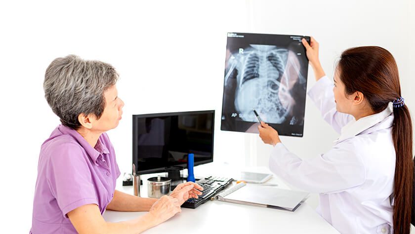 Doctor and patient looking at an xray